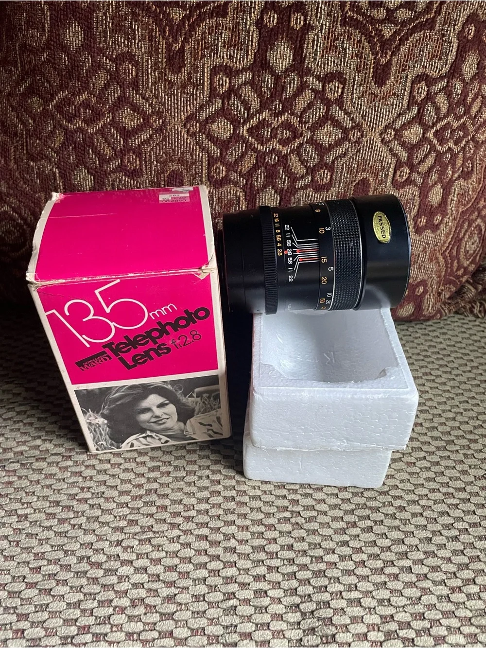 135mm f/2.8 Telephoto Lens in Pink Packaging